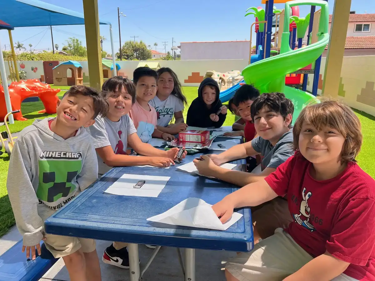 Structured activities, homework help, and enrichment for school-age children at O.C. Kids Preschool.