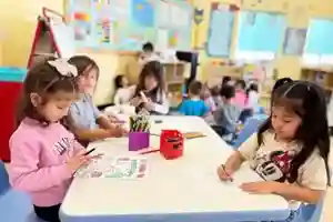 Children engaged in classroom activities at OC Kids Preschool Garden Grove