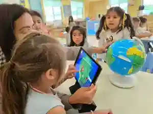 Theme-based curriculum technology activity at OC Kids Preschool